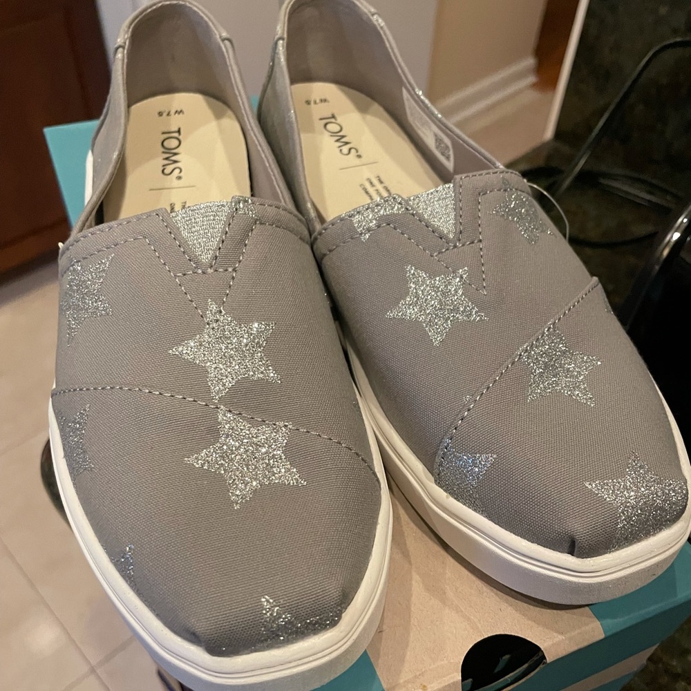 Brand new Toms shoes (with tags). Size 7.5.